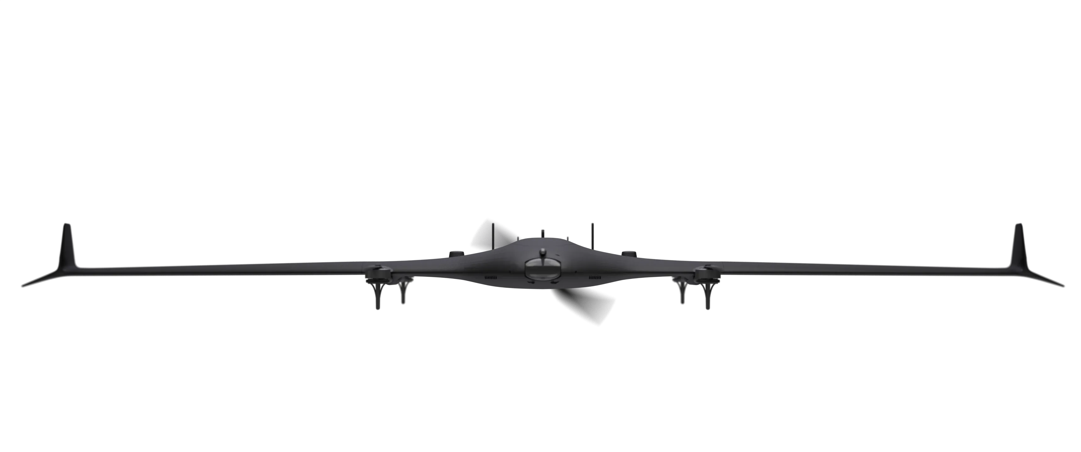 TerraHawk seen head-on in the studio, a blended-wing aircraft with upswept wingtips and four rotors.